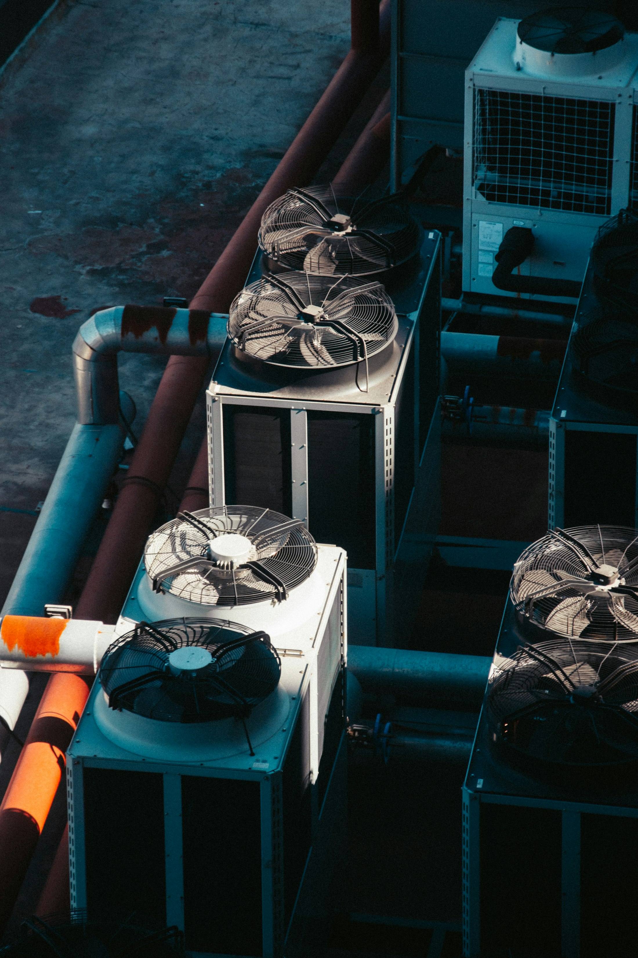 Rows of air-conditioning condenser units with fans